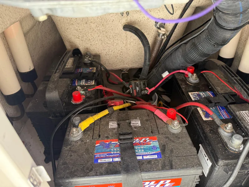 Slide: The Image of Batteries and wiring inside a 2021 Carolina Skiff 192 JLS boat. - 27