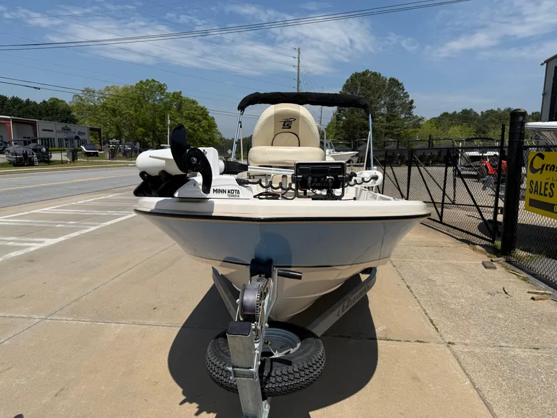 Slide: The Image of 2021 Carolina Skiff 192 JLS boat on trailer, parked outdoors, sunny day. - 3