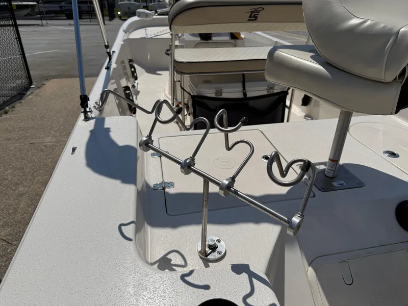 Slide: The Image of 2021 Carolina Skiff 192 JLS boat interior with rod holders and seating. - 32