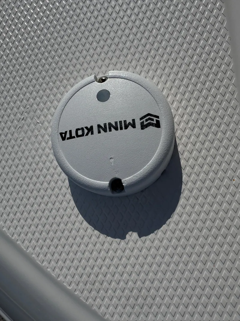 Slide: The Image of Minn Kota component on 2023 Robalo 246 Cayman boat deck. - 36
