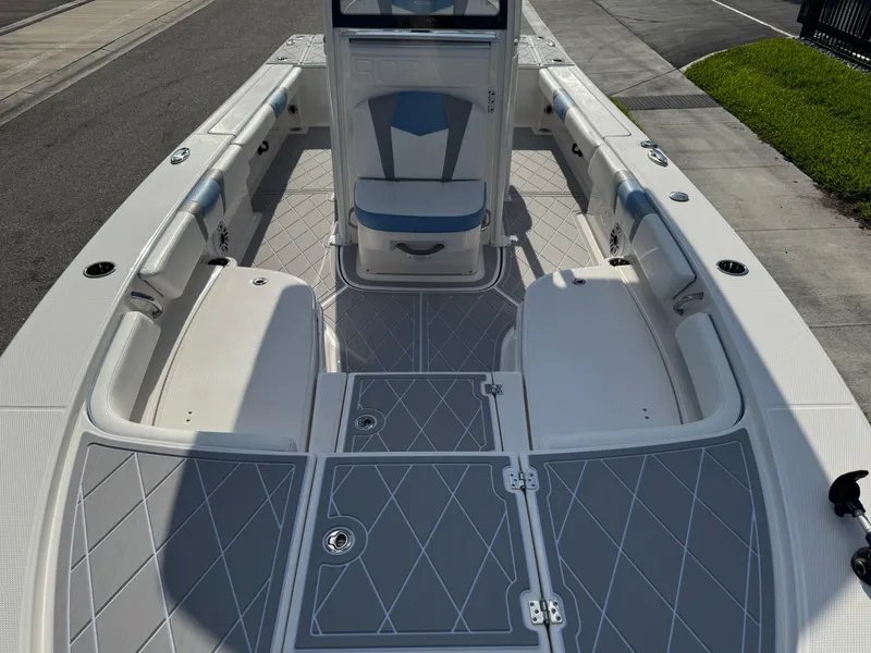 Slide: The Image of 2023 Robalo 246 Cayman boat interior with spacious seating and modern design. - 38