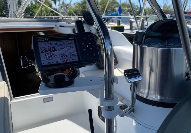 Slide: The Image of Cockpit of 1997 Catalina 320 sailboat with navigation equipment and compass. - 18