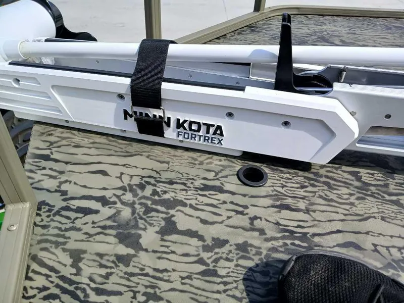 Slide: The Image of Minn Kota Fortrex trolling motor on 2025 Tracker Grizzly 2072 CC Sportsman boat. - 8