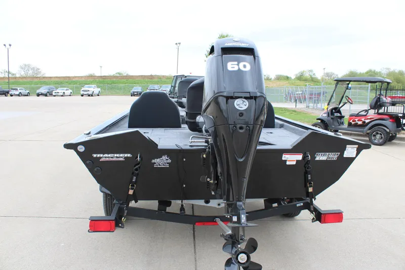 Slide: The Image of 2025 Tracker Pro Team 175 boat with 60 HP motor on a trailer. - 6