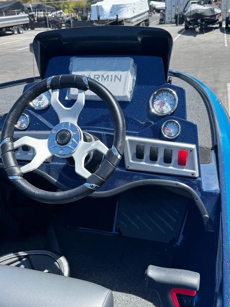 Slide: The Image of Steering console of a 2025 Nitro Z18 Pro boat with Garmin navigation system. - 4