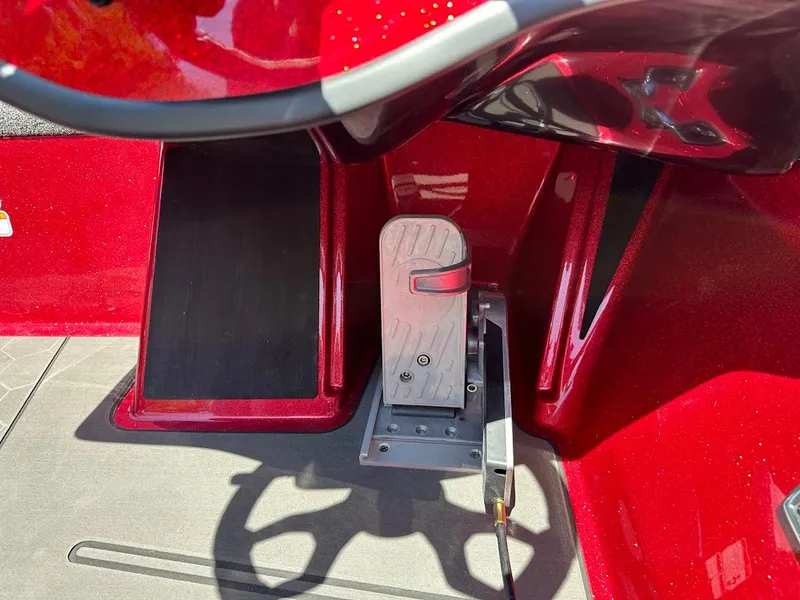 Slide: The Image of Red interior of 2025 Nitro Z19 Pro boat with foot pedal control. - 21