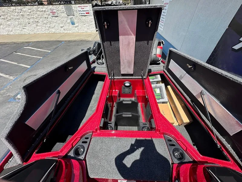 Slide: The Image of Open storage compartments of a 2025 Nitro Z19 Pro boat, showcasing interior features. - 27