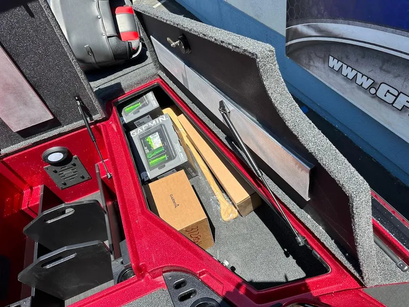 Slide: The Image of Storage compartment of 2025 Nitro Z19 Pro boat with Garmin equipment. - 30