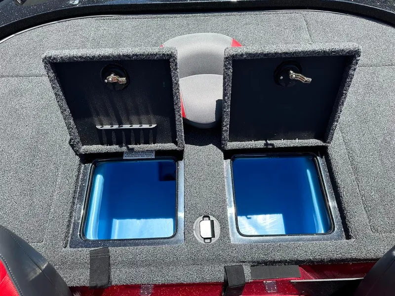Slide: The Image of Open storage compartments on a 2025 Nitro Z19 Pro boat deck. - 31