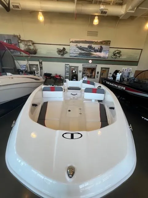 Slide: The Image of 2025 Tahoe T16 boat displayed in a showroom with modern interior design. - 3