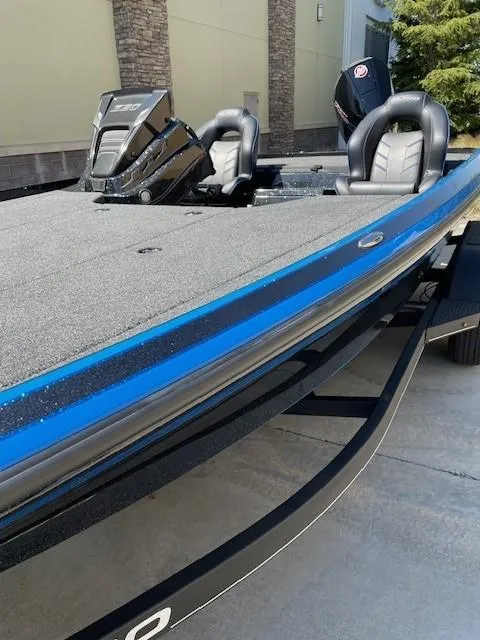 Slide: The Image of 2024 Nitro Z20 boat with sleek design, blue accents, and comfortable seating. - 7