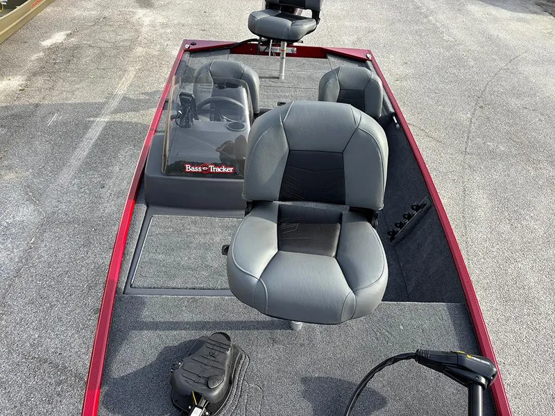 Slide: The Image of 2025 Tracker Bass Tracker Classic XL boat with gray seats and red trim. - 11