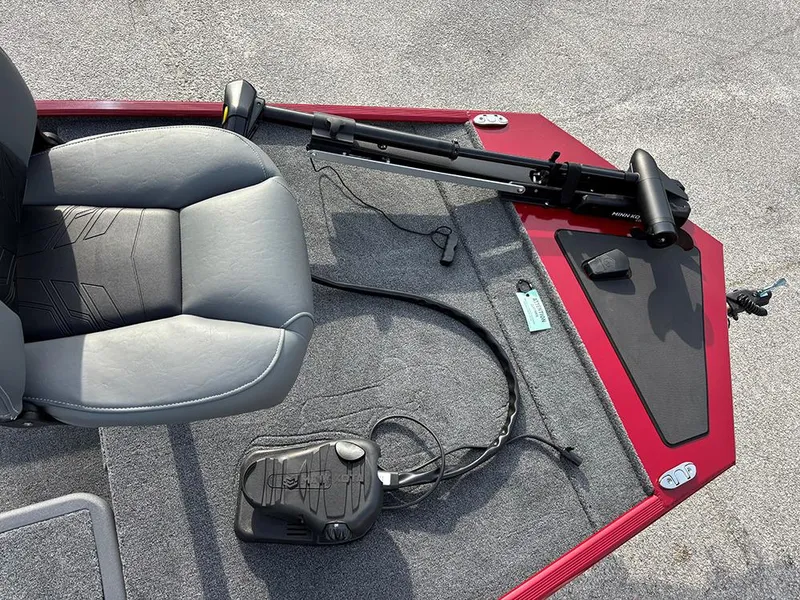 Slide: The Image of 2025 Tracker Bass Tracker Classic XL boat interior with seat and trolling motor. - 12