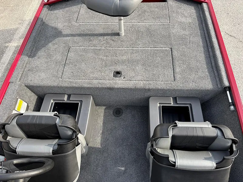 Slide: The Image of 2025 Tracker Bass Tracker Classic XL boat interior with seating and storage compartments. - 16
