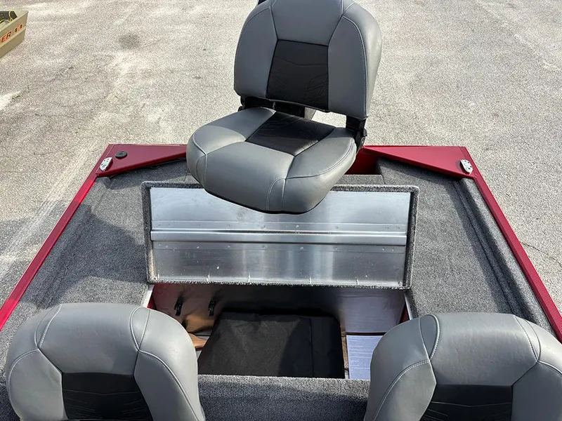 Slide: The Image of 2025 Tracker Bass Tracker Classic XL boat interior with seating and storage compartment. - 18