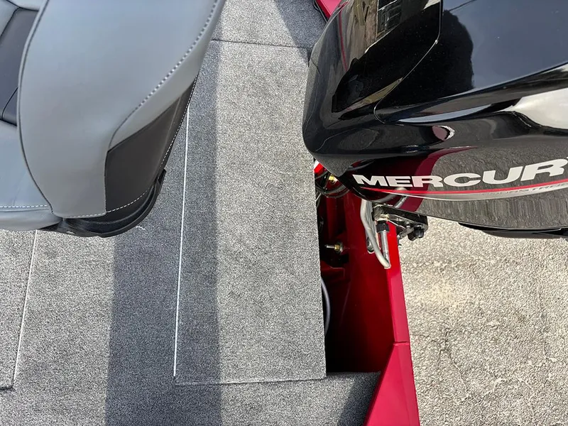 Slide: The Image of 2025 Tracker Bass Tracker Classic XL boat interior with Mercury engine and gray seating. - 19