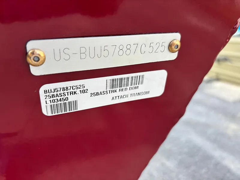 Slide: The Image of 2025 Tracker Bass Tracker Classic XL boat identification plate with serial number and model details. - 22