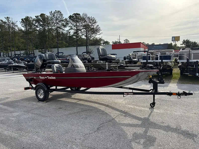 Slide: The Image of 2025 Tracker Bass Tracker Classic XL boat on trailer in outdoor dealership lot. - 8