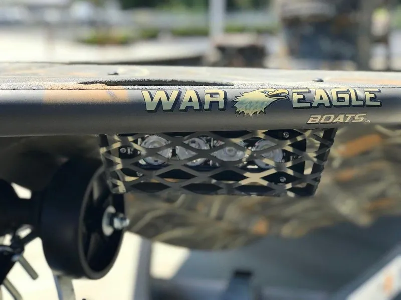 Slide: The Image of War Eagle Blackhawk 961 boat detail, showcasing logo and design, 2025 model. - 11