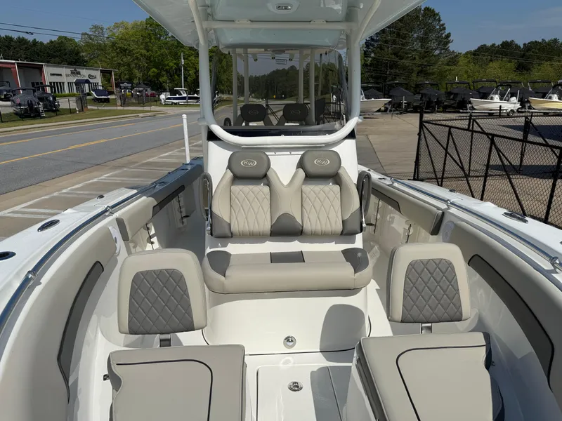 Slide: The Image of 2025 Key West 260 CC boat interior with luxurious seating and modern design. - 12