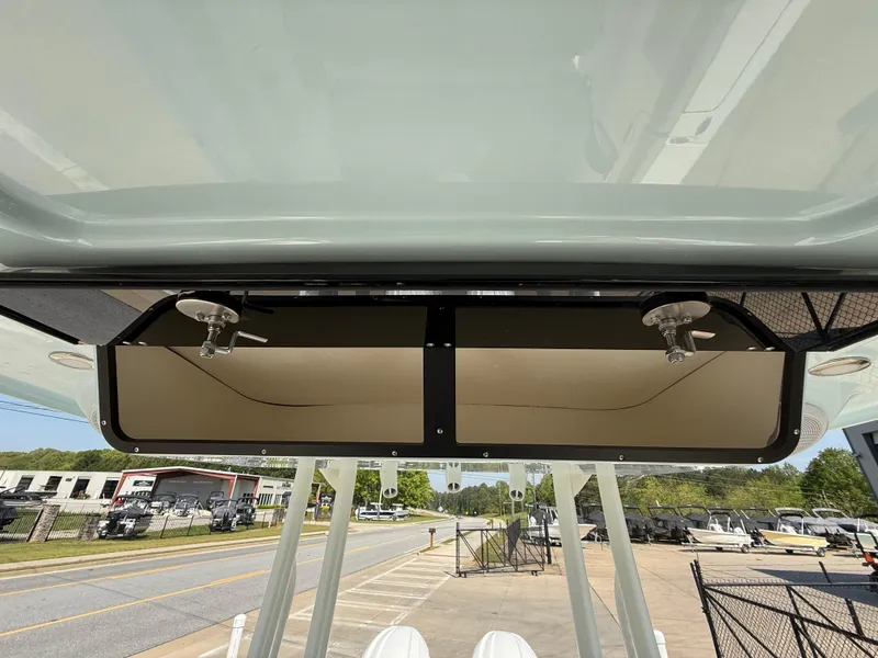 Slide: The Image of 2025 Key West 260 CC boat console with storage compartments, viewed from below. - 30