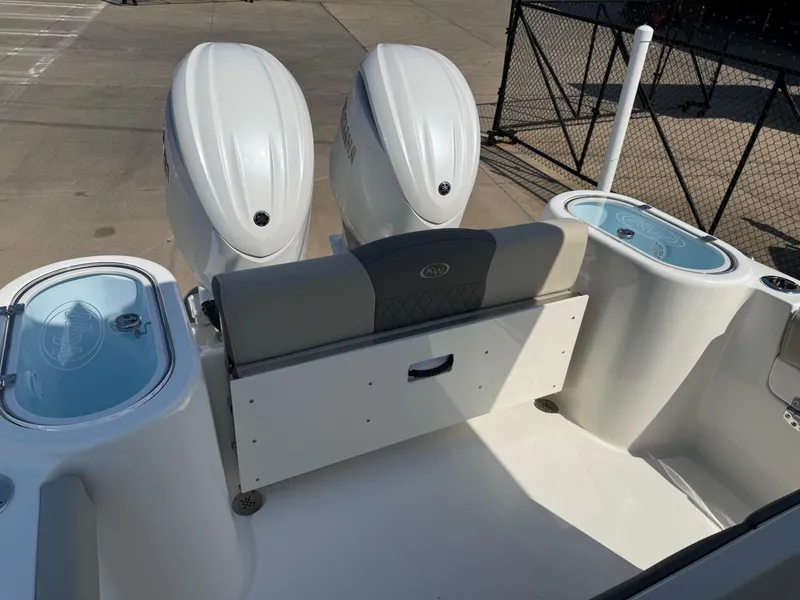 Slide: The Image of 2025 Key West 260 CC boat with dual engines and seating area. - 32