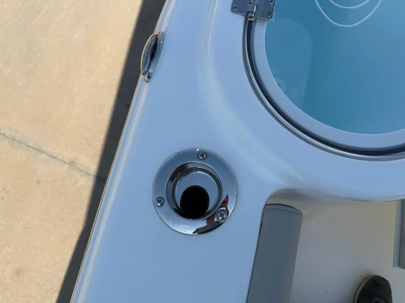 Slide: The Image of 2025 Key West 260 CC boat deck with stainless steel fitting and hatch. - 36