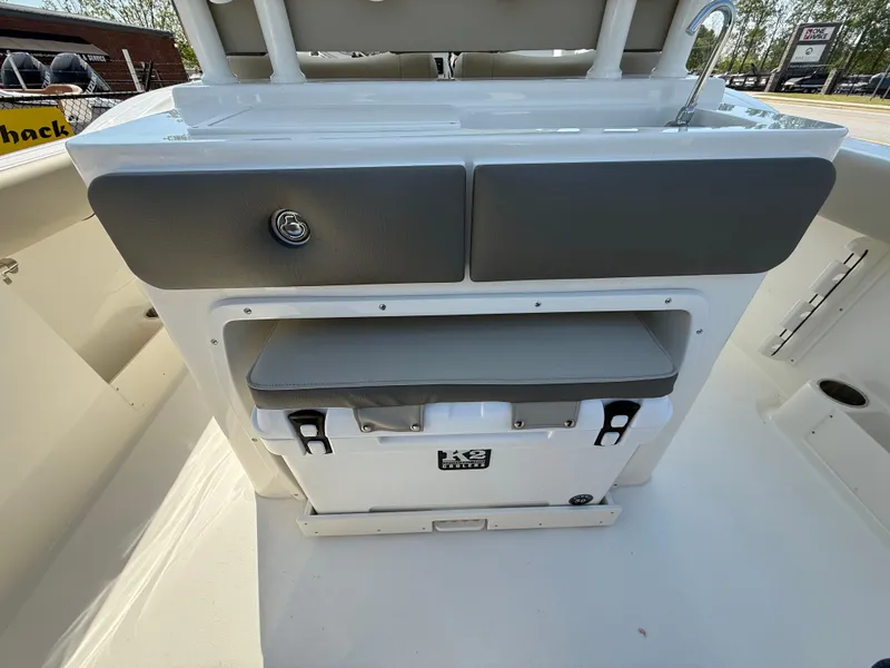 Slide: The Image of 2025 Key West 260 CC boat console with storage and seating. - 43