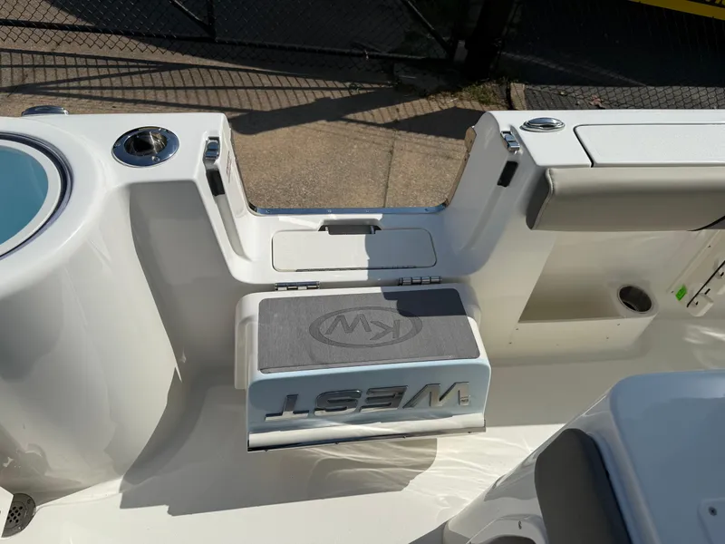 Slide: The Image of 2025 Key West 260 CC boat interior with seating and storage compartments. - 46