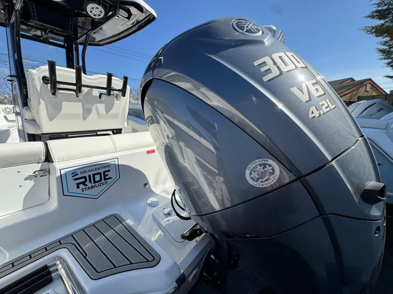 Slide: The Image of 2025 Tidewater 232 LXF boat with Yamaha 300 V6 engine, showcasing SeaStar Solutions technology. - 4