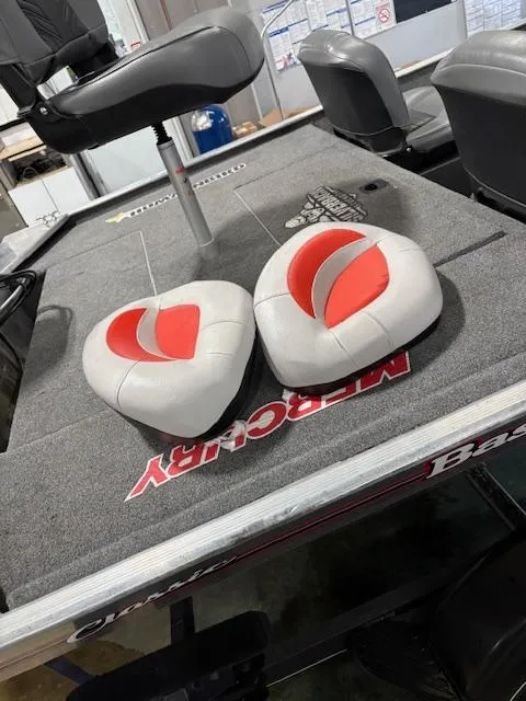 Slide: The Image of 2019 Bass Tracker Classic boat interior with seats and carpeted deck. - 10