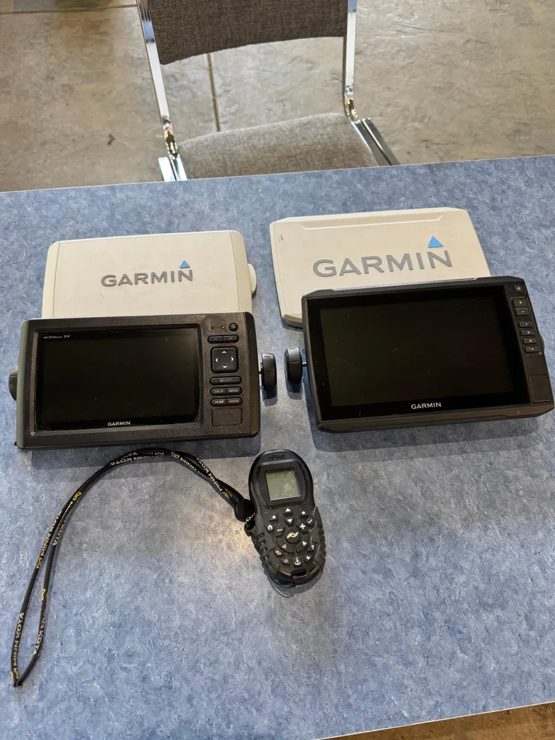 Slide: The Image of Garmin fish finders and remote on table, suitable for 2019 Bass Tracker Classic. - 11