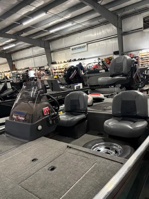 Slide: The Image of 2019 Bass Tracker Classic boat in showroom with seating and equipment. - 4