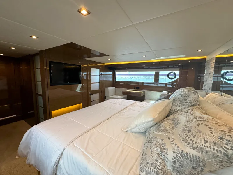 Slide: The Image of Luxurious bedroom interior of 2021 Cruisers Yachts 60 Cantius with modern amenities. - 11