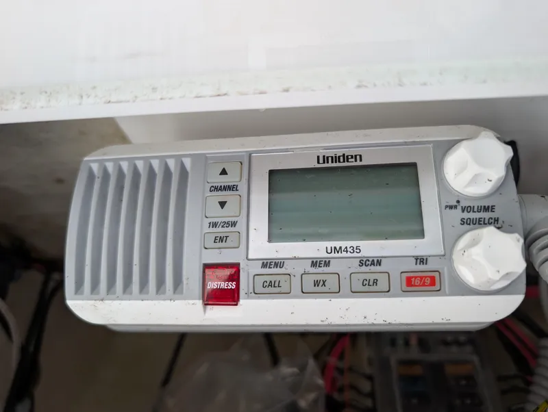 Slide: The Image of Uniden UM435 marine radio on 2022 Tidewater 256 CC Adventure boat. - 16