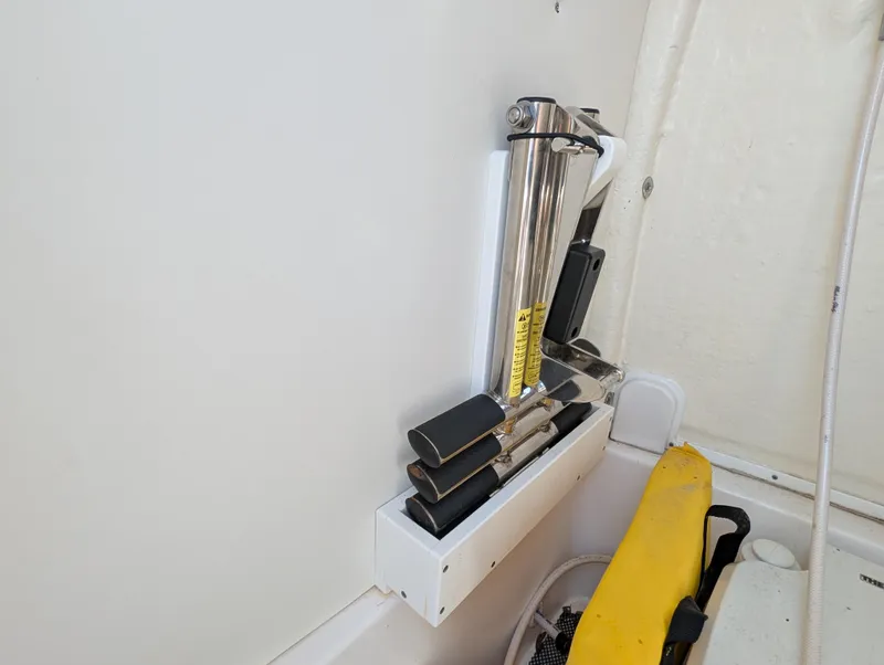 Slide: The Image of Rod holder on 2022 Tidewater 256 CC Adventure boat interior. - 22