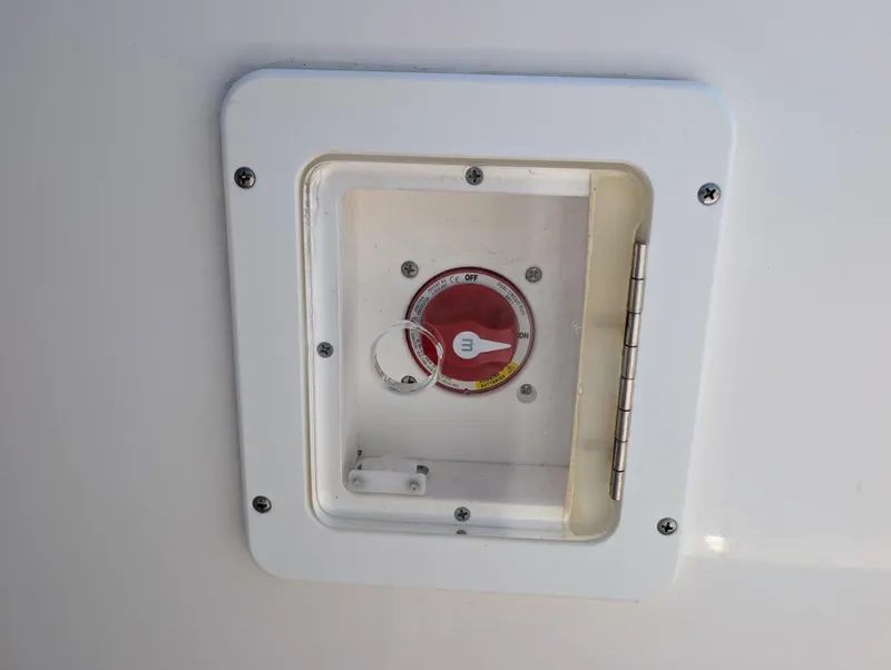 Slide: The Image of Control panel on 2022 Tidewater 256 CC Adventure boat, featuring a red dial. - 44
