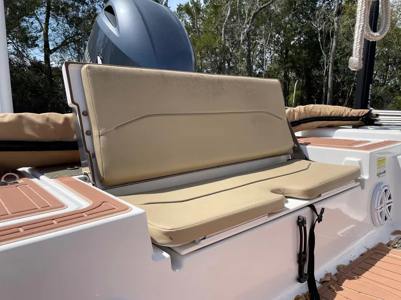 Slide: The Image of 2017 Sportsman Masters 207 Bay Boat with beige seating and sleek design. - 12