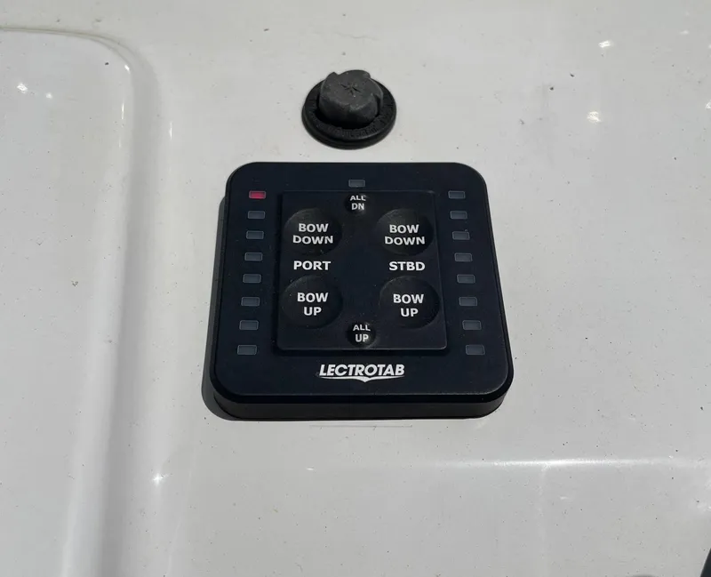 Slide: The Image of Control panel for Lectrotab trim tabs on a 2017 Sportsman Masters 207 Bay Boat. - 21