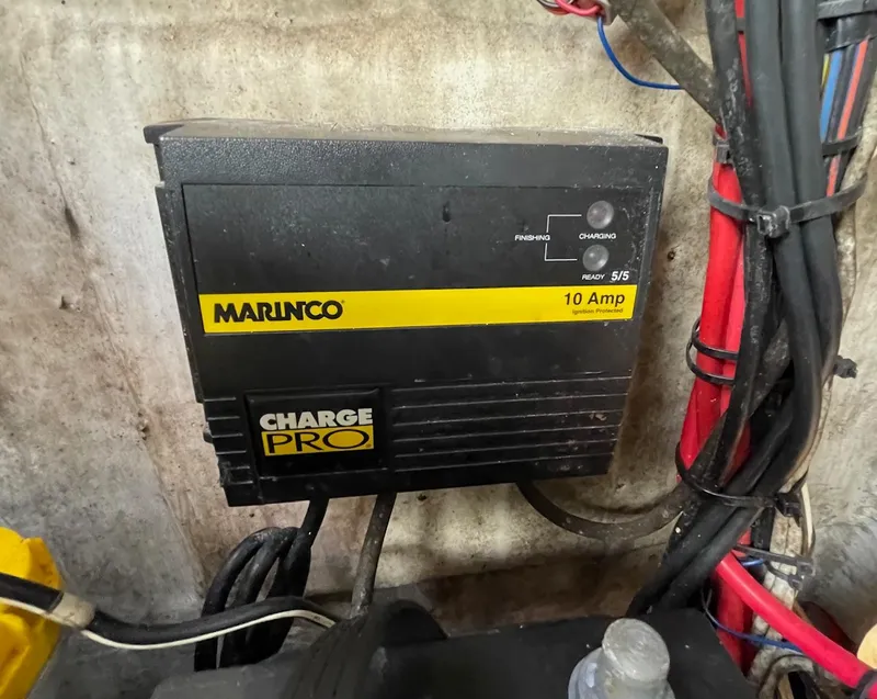 Slide: The Image of Marinco Charge Pro 10 Amp battery charger in 2017 Sportsman Masters 207 Bay Boat. - 24