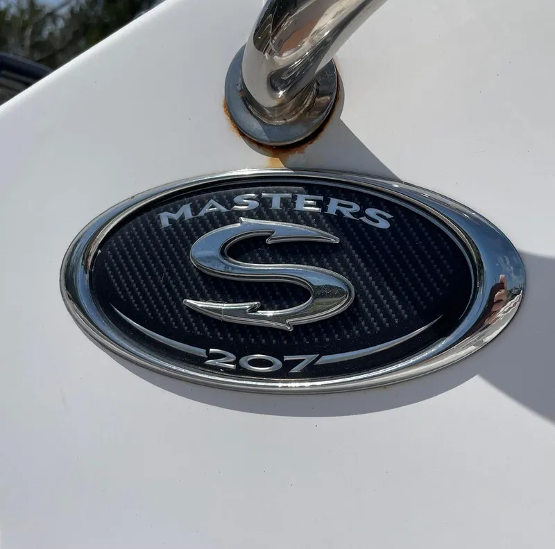 Slide: The Image of 2017 Sportsman Masters 207 Bay Boat emblem with chrome detailing. - 32