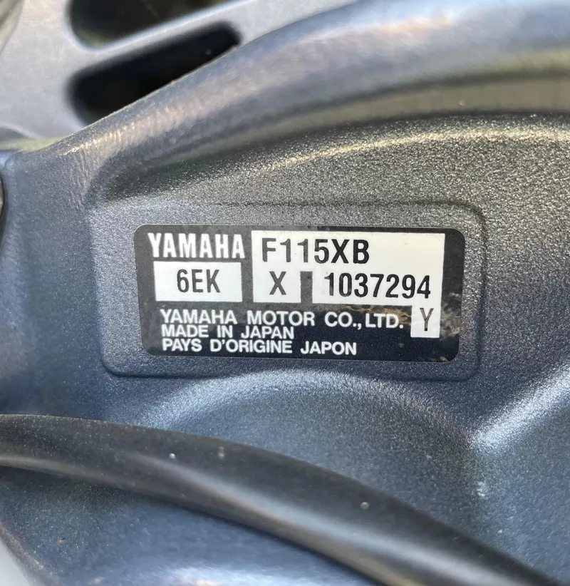 Slide: The Image of Yamaha F115XB engine label on a 2017 Sportsman Masters 207 Bay Boat. - 34