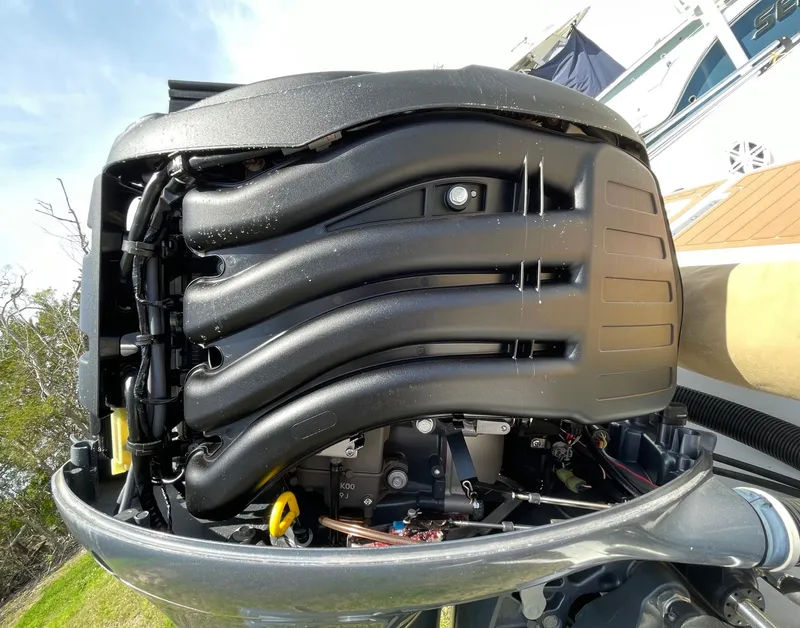 Slide: The Image of 2017 Sportsman Masters 207 Bay Boat engine, detailed view of components and design. - 36