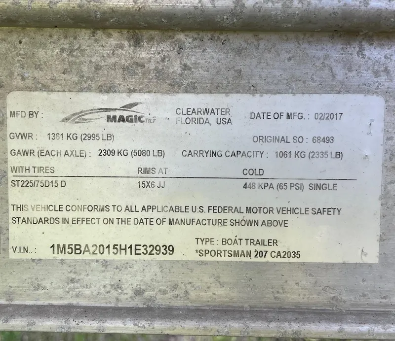 Slide: The Image of Label on 2017 Sportsman Masters 207 Bay Boat trailer, detailing specifications and compliance information. - 38