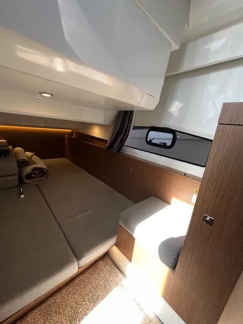 Slide: The Image of Interior of 2020 Jeanneau NC 1095 Fly, featuring cozy cabin and modern design. - 24