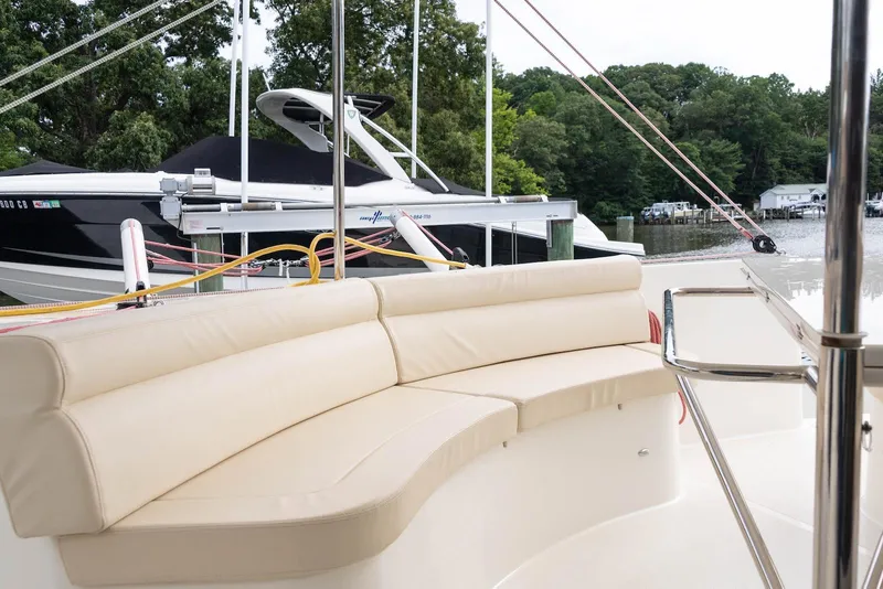 Slide: The Image of Luxurious seating on a Balance 451 yacht, 2017 model, docked near lush greenery. - 14