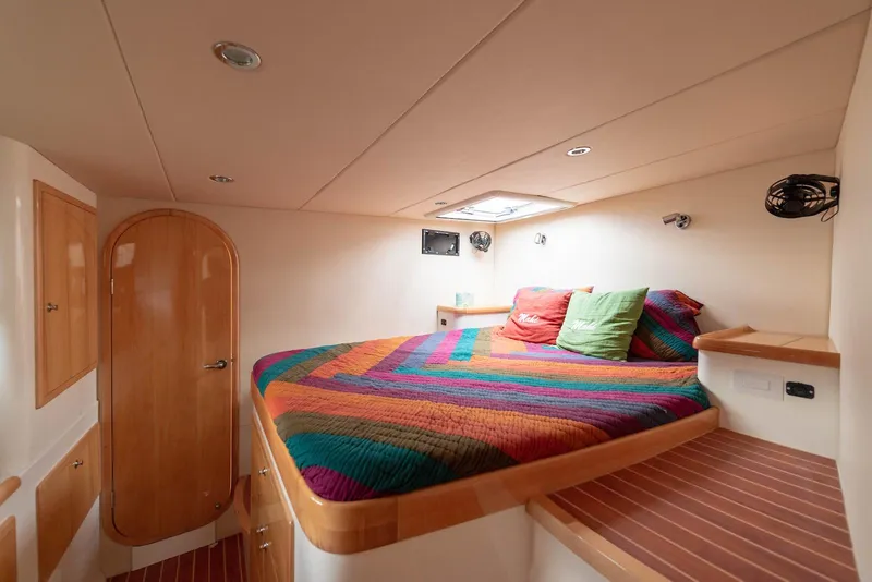 Slide: The Image of Cozy cabin interior with colorful bedding on a Balance 451 yacht, 2017 model. - 23