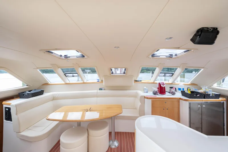 Slide: The Image of Luxurious interior of 2017 Balance 451 yacht with modern seating and panoramic windows. - 27