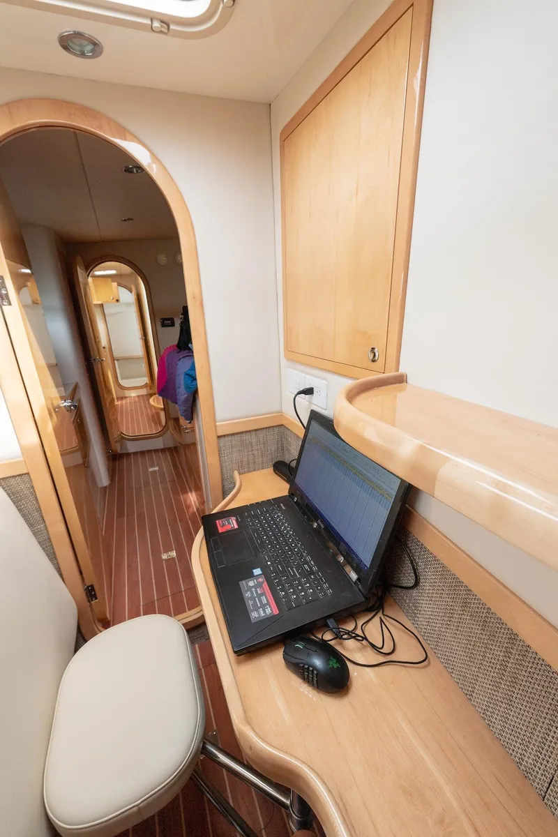 Slide: The Image of Compact workspace with laptop in 2017 Balance 451 yacht interior. - 28