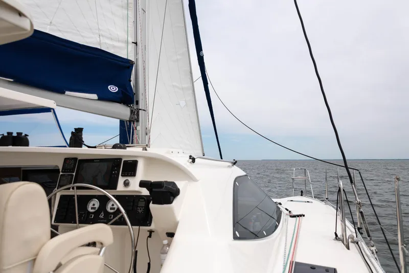 Slide: The Image of Sailing on a Balance 451 catamaran, 2017 model, with open sea view. - 3